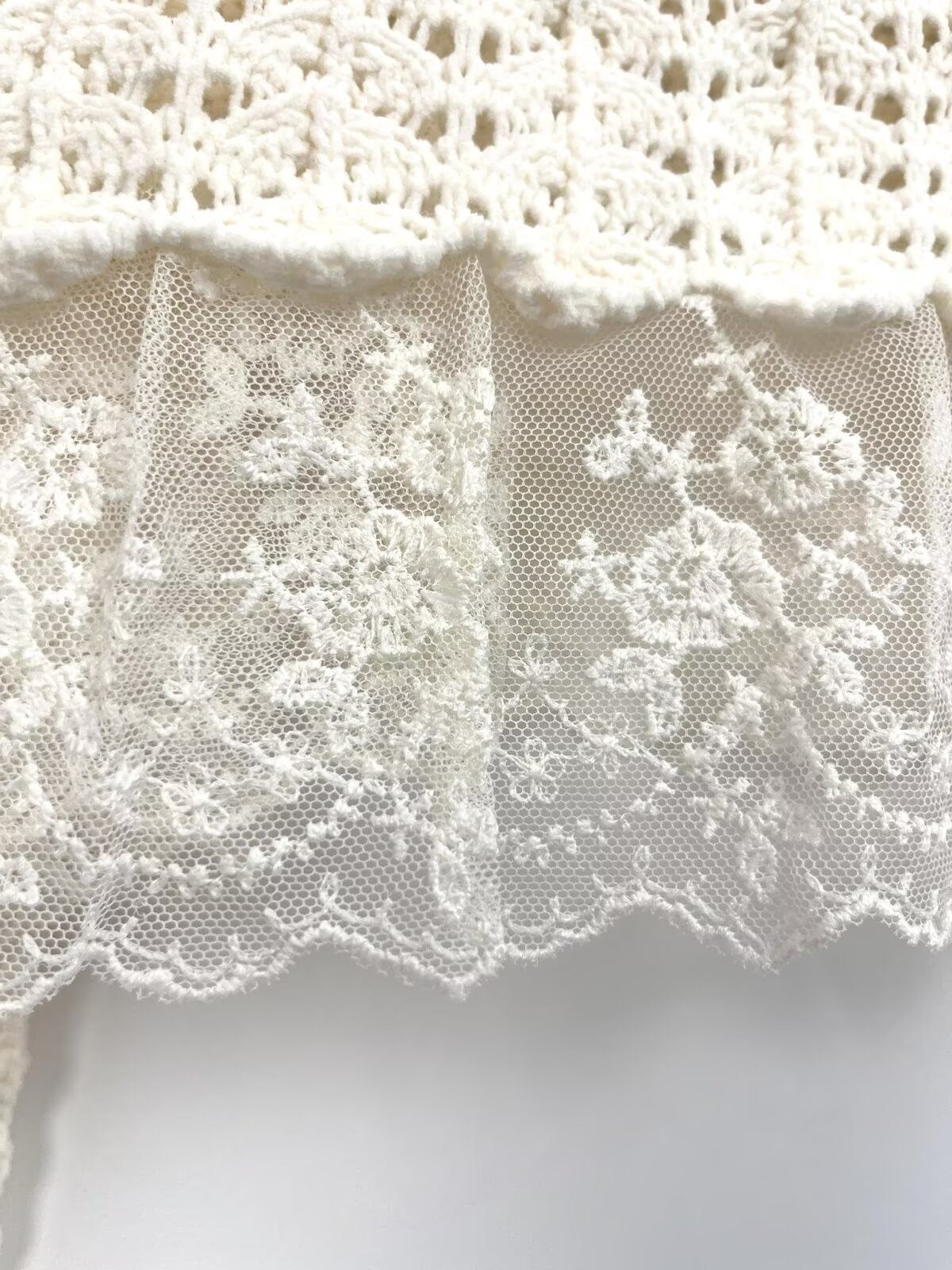 Women's new fashion O Neck long sleeved patchwork hem knitted cardigan