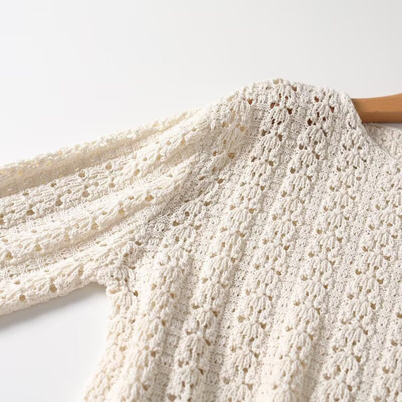 Women's new fashion long sleeved hollow crochet O-Neck knitted top