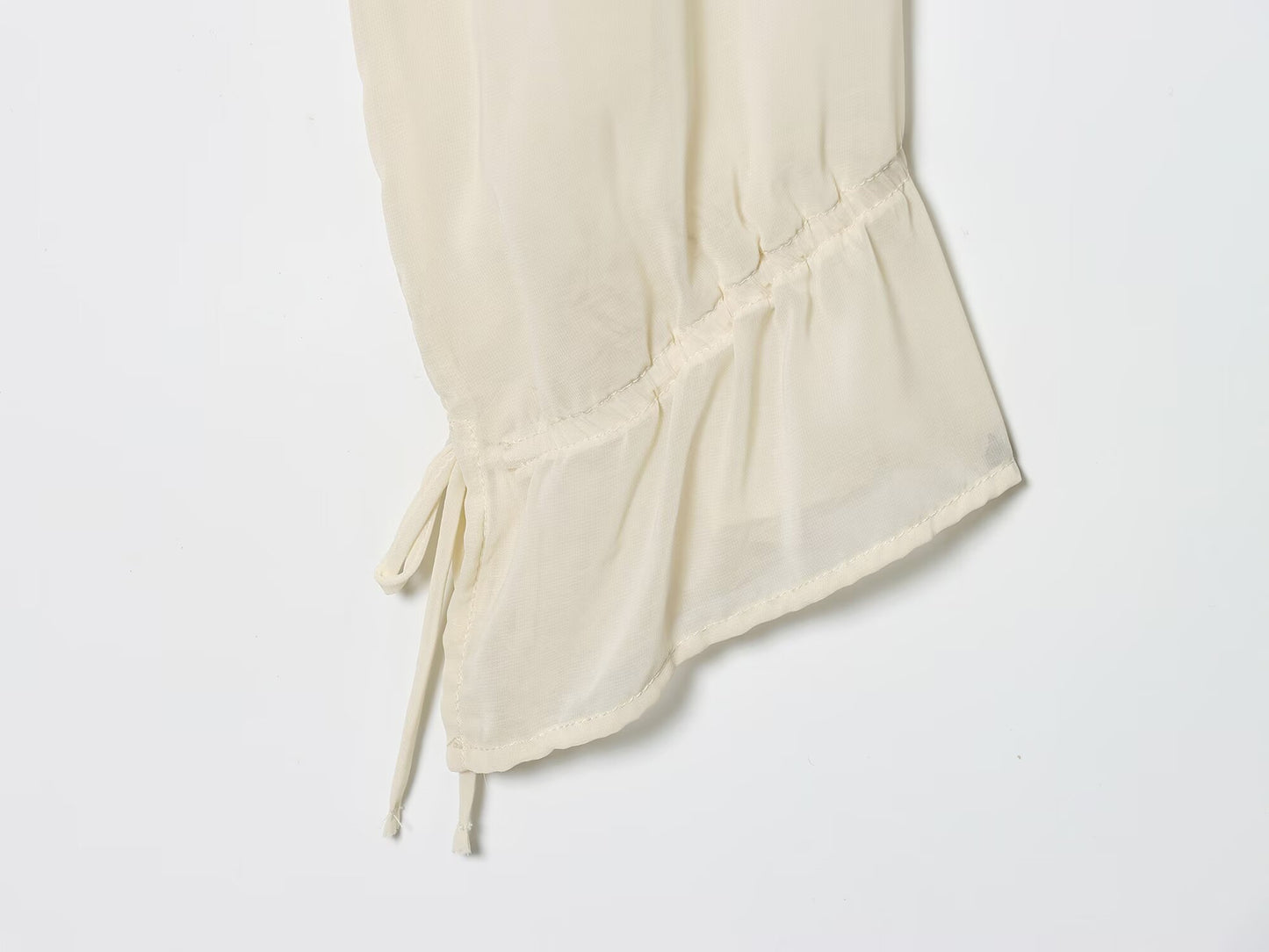 Women's new short layered decorative long sleeved top