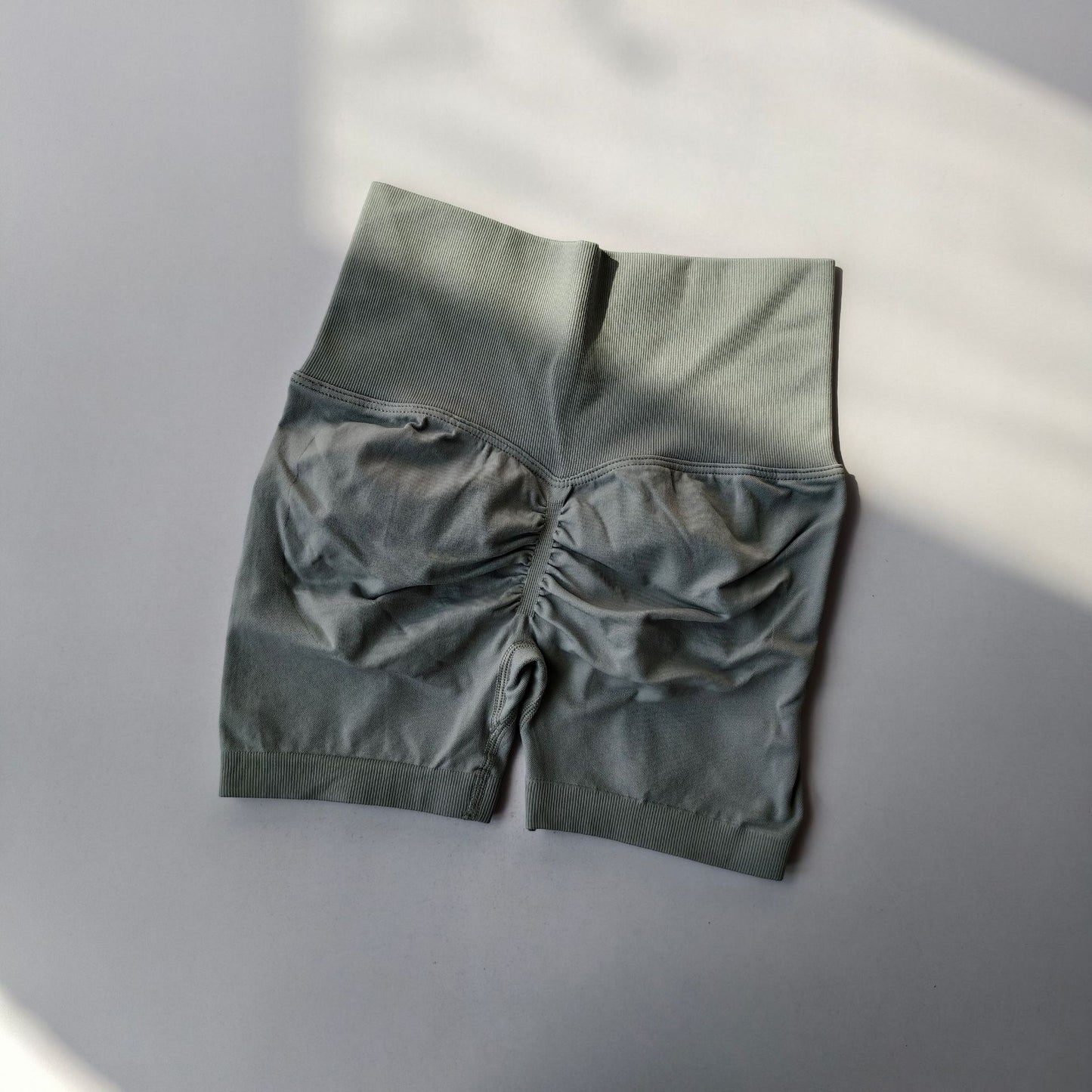Women's new casual high waist hip running training quick-drying running training shorts.