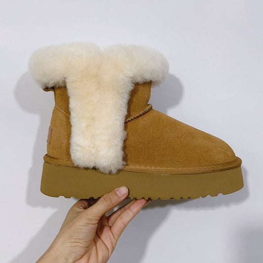 Women's plush snow boots with plush platform have a shoe box