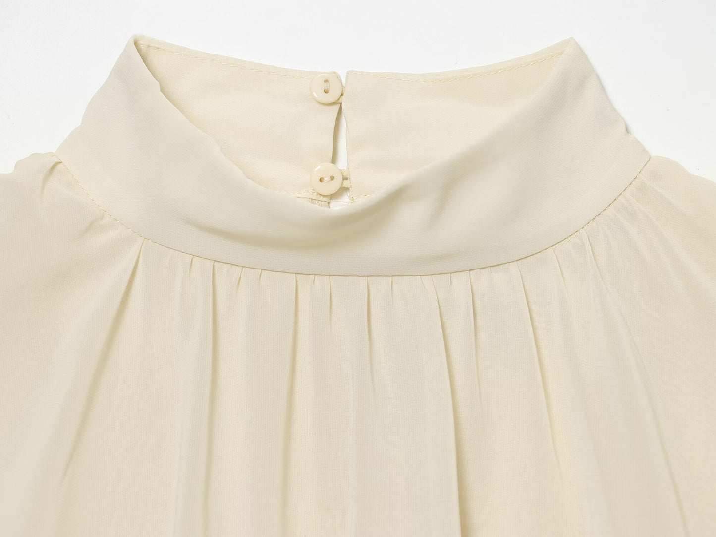 Women's new short layered decorative long sleeved top