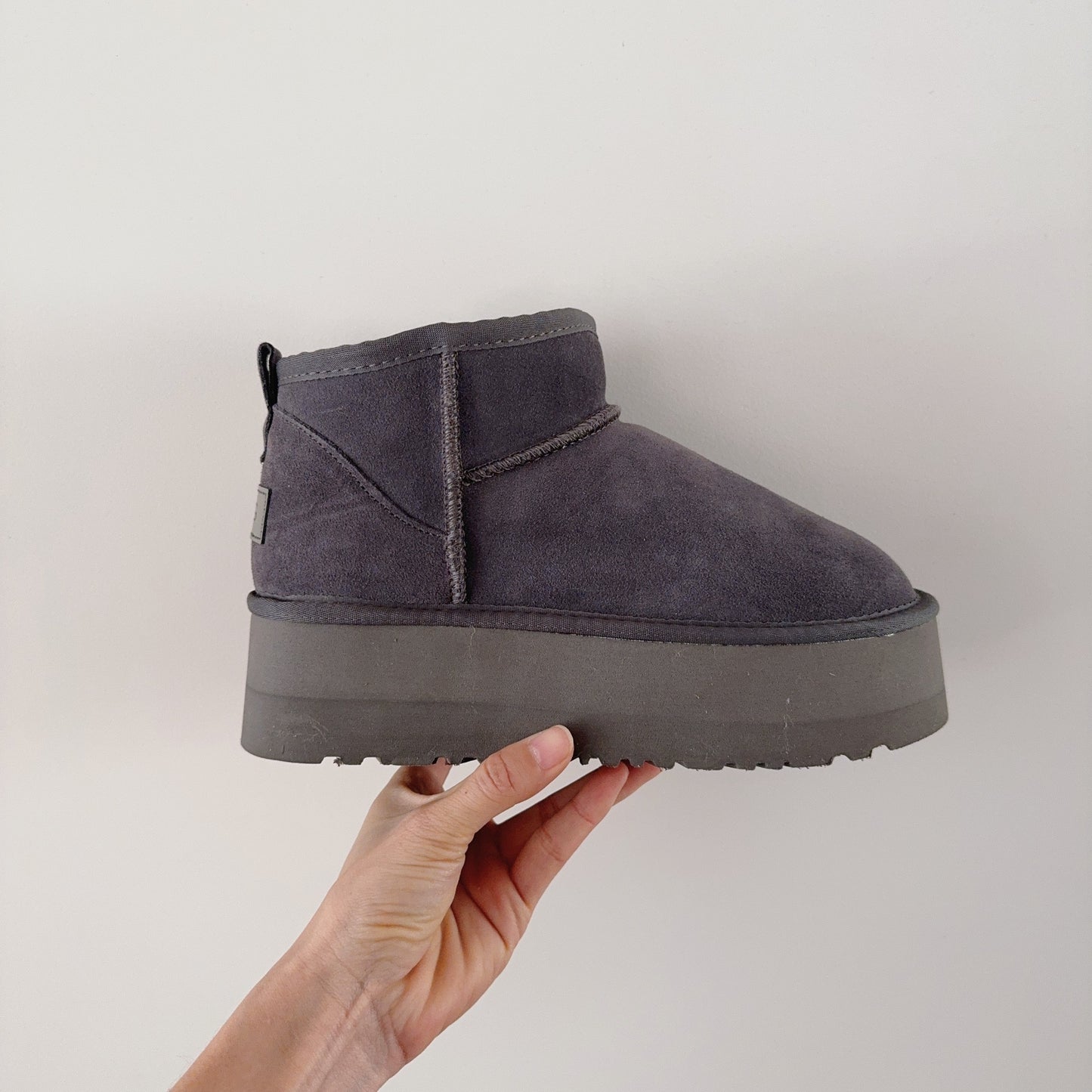 New ultra-high sole snow boots have a shoe box