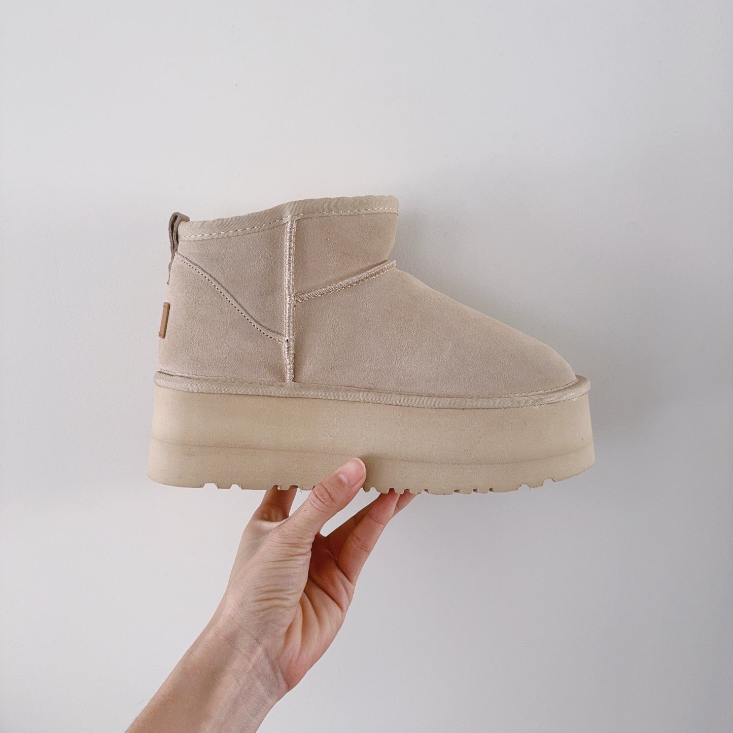 New ultra-high sole snow boots have a shoe box