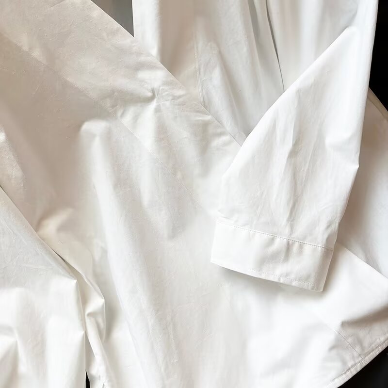 Women's new fashion loose white long sleeved V-neck shirt