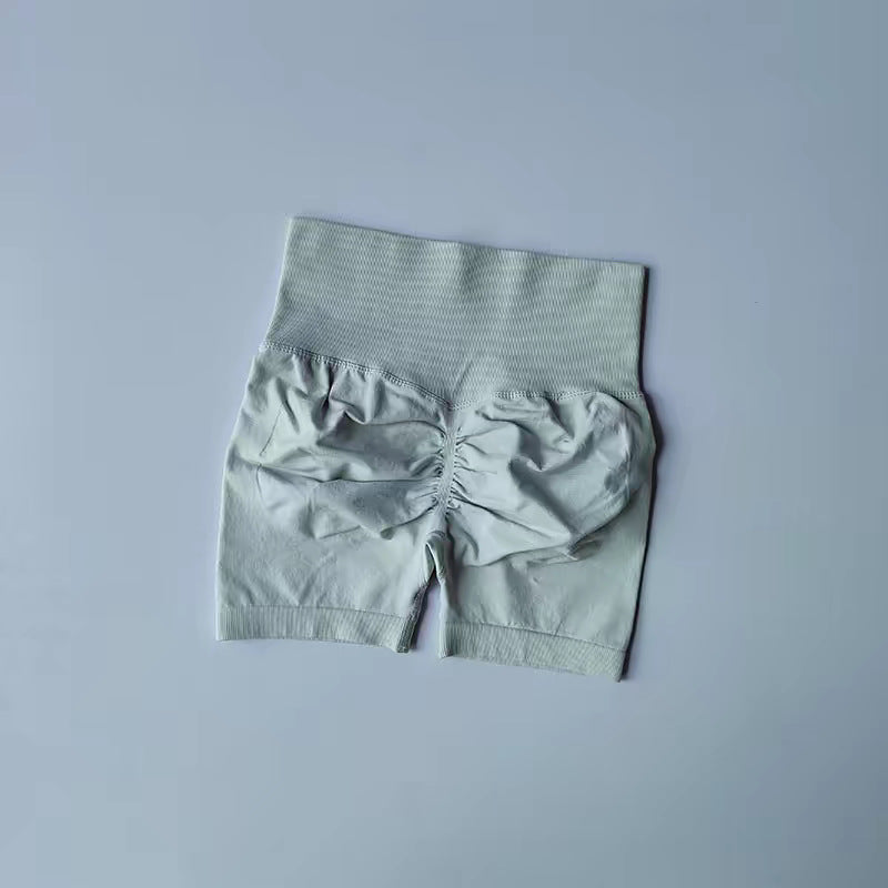 Women's new casual high waist hip running training quick-drying running training shorts.