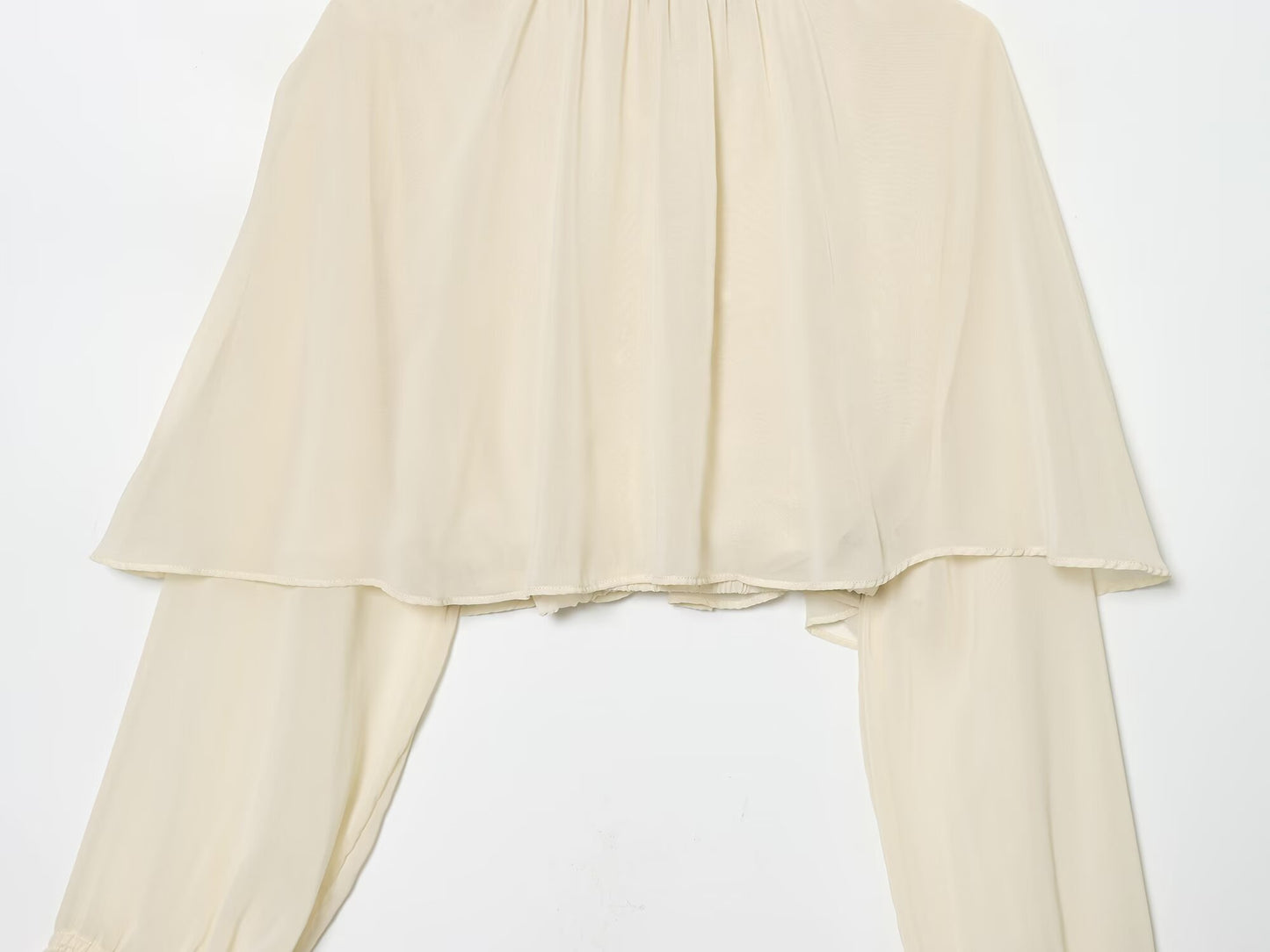 Women's new short layered decorative long sleeved top