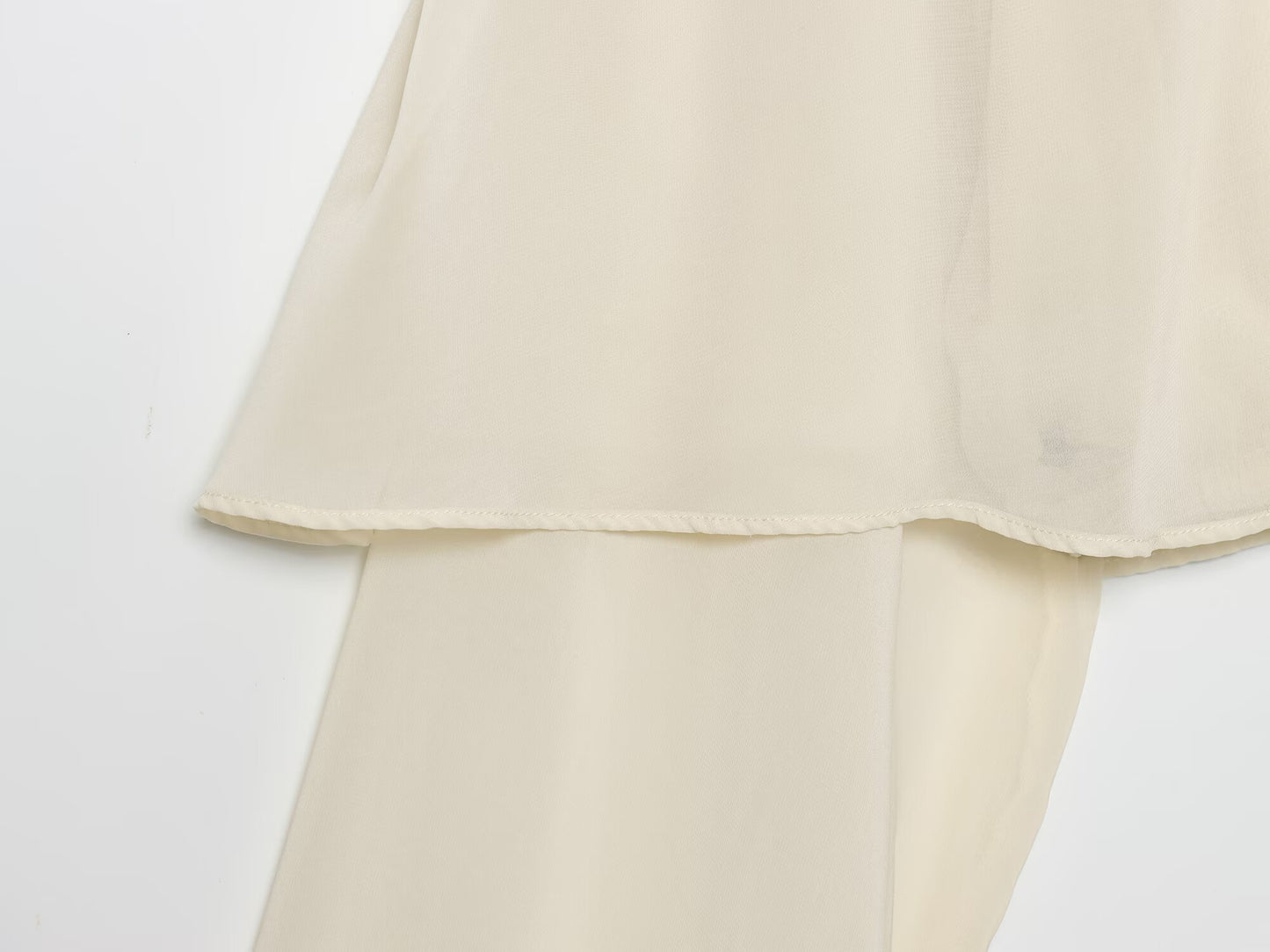 Women's new short layered decorative long sleeved top