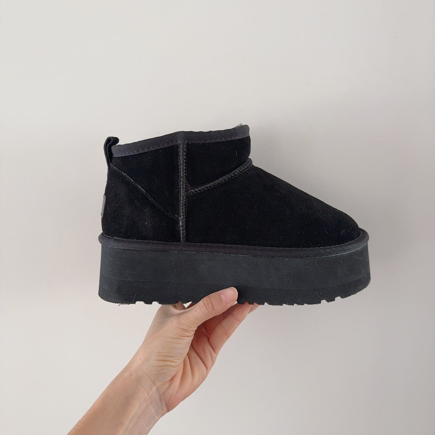 New ultra-high sole snow boots have a shoe box