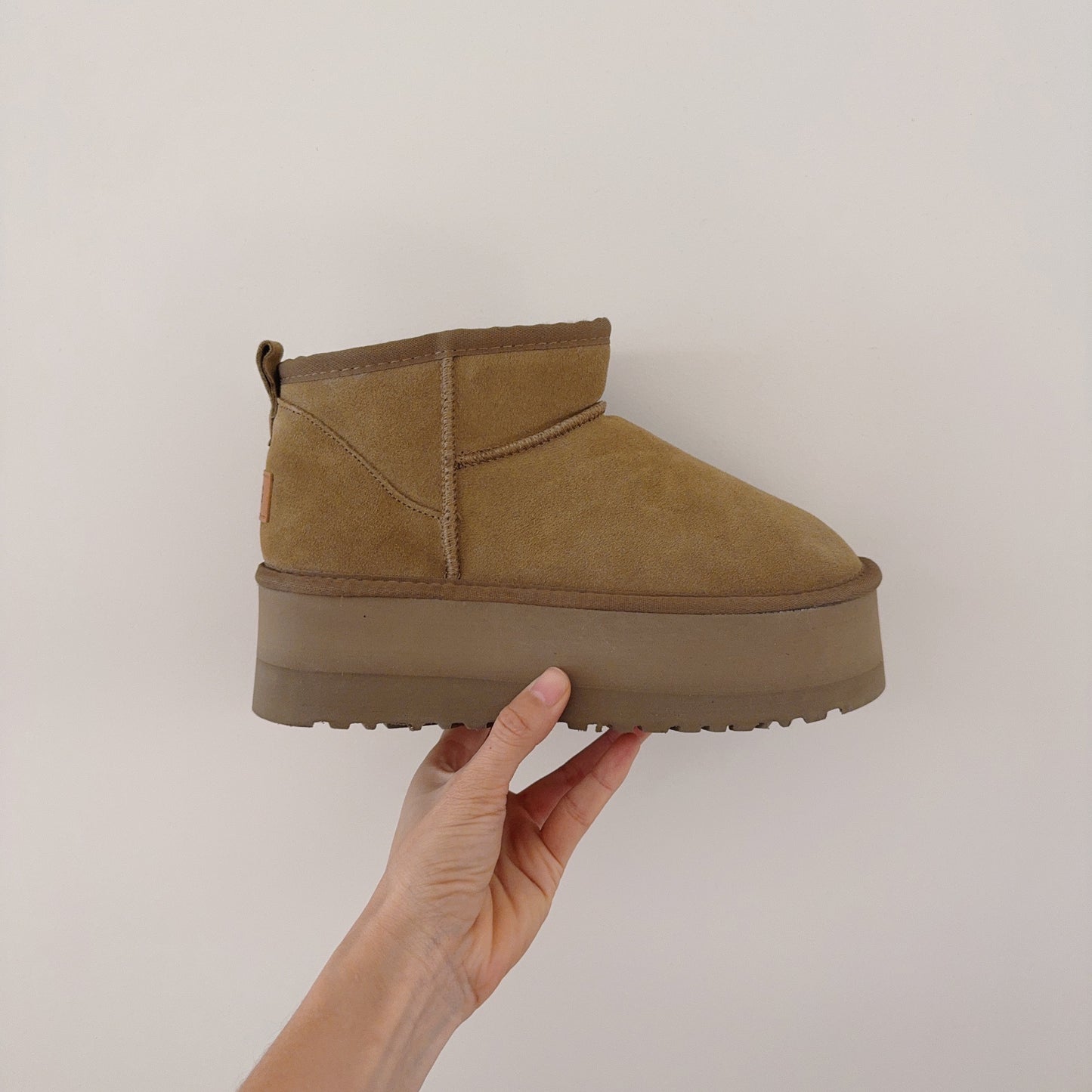 New ultra-high sole snow boots have a shoe box