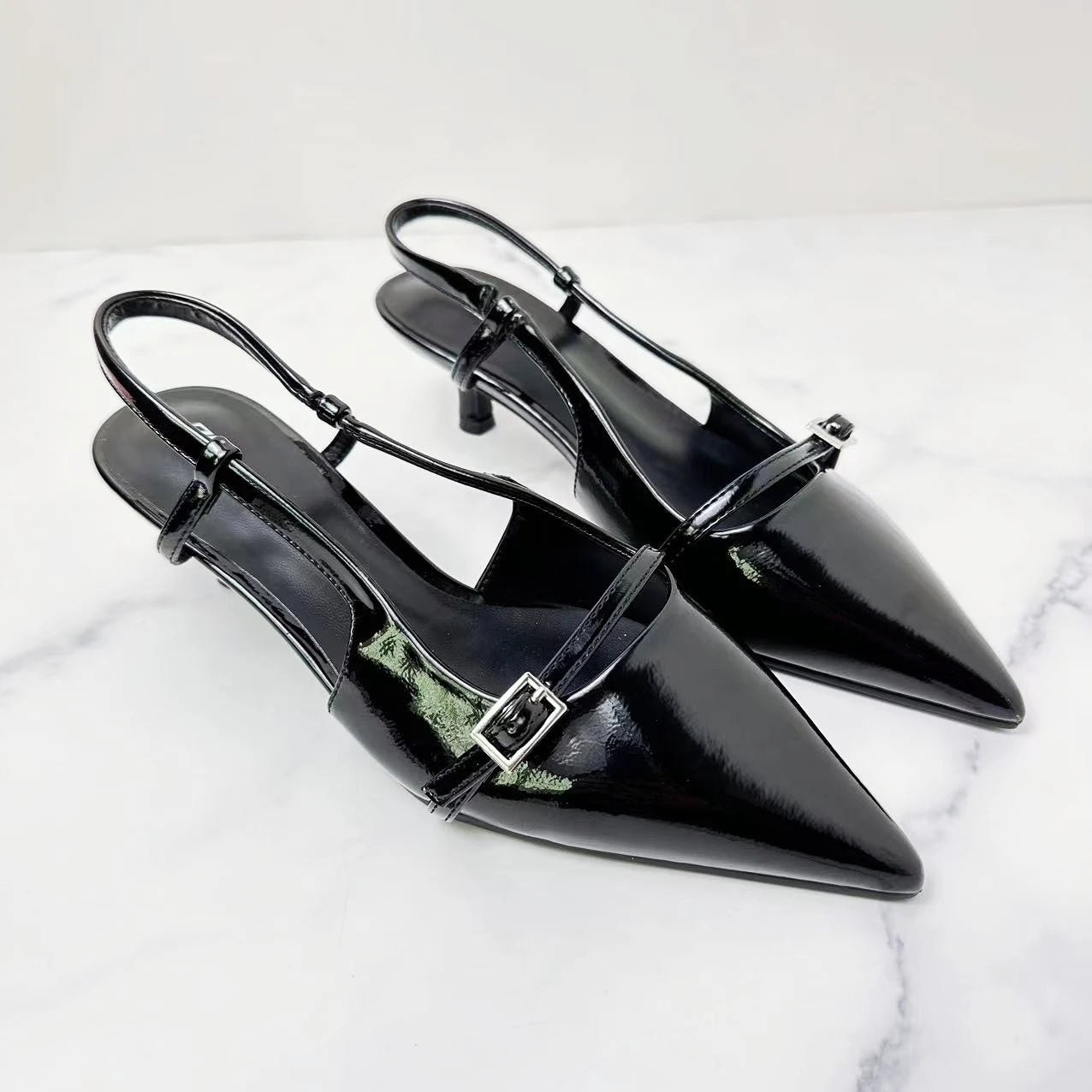 New Women's Shoes With Black Buckles, Strapless Shoes, Pointed Belt Buckles and Shallow Sandals.