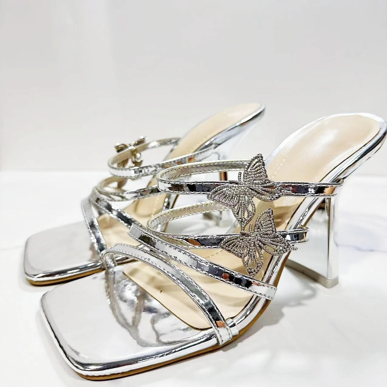 New 2024 Women's Shoes Fashion Temperament Joker Sandals Silver Metal Butterfly Stilettos.